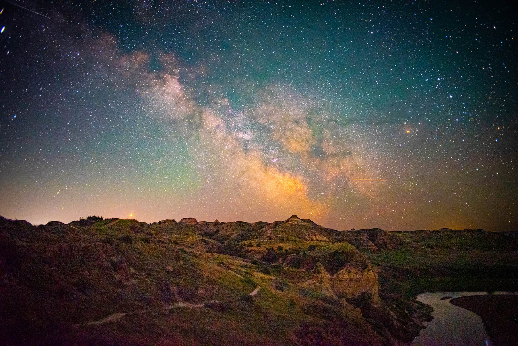 Milky way shot over the Little Missouri River in Theodore National Park, ND